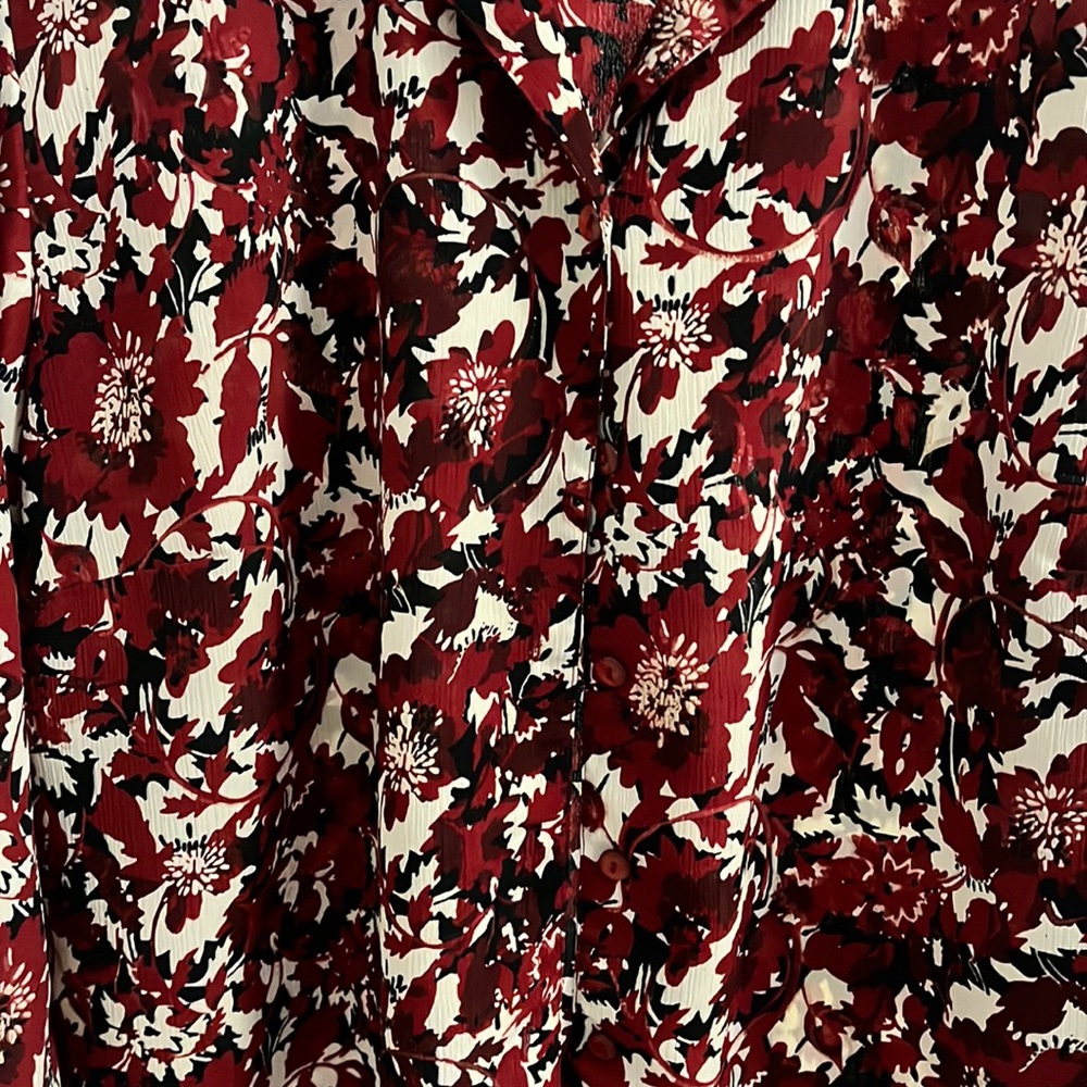 Floral Print shirt with full sleeves.
